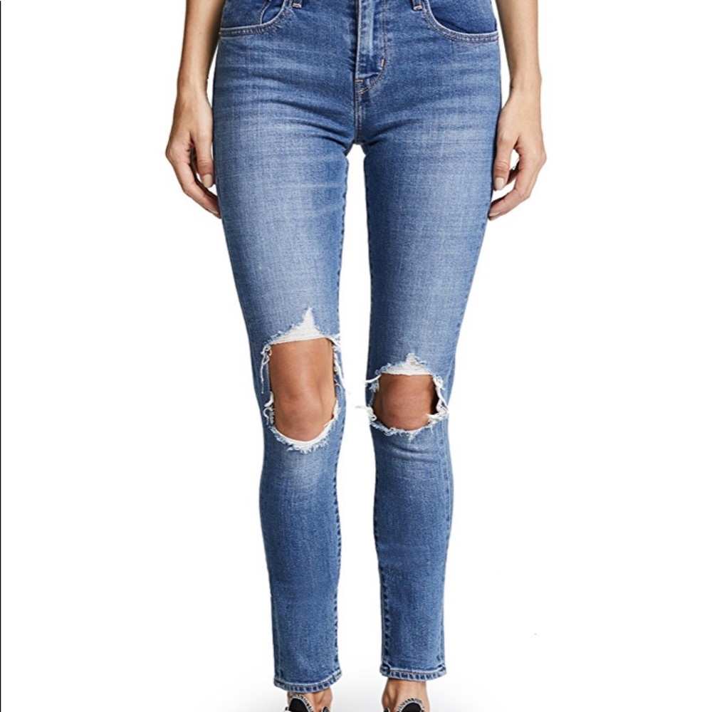 Levi’s 721 high rise distressed skinny jeans.
